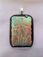 Load image into Gallery viewer, These beautiful, hand-crafted glass rectangular pendants, approximately 1-3/4 inches by 1-1/8 inches, are sold individually, each with a unique design. Great gift! Once sold, that individual pendant is no longer available. Jewelry. Artist: KB. This pendant is gold, a bit of green with black edge.