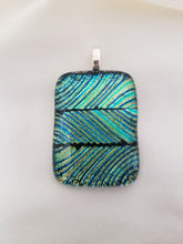 Load image into Gallery viewer, These beautiful, hand-crafted glass rectangular pendants, approximately 1-3/4 inches by 1-1/8 inches, are sold individually, each with a unique design. Great gift! Once sold, that individual pendant is no longer available. Jewelry. Artist: KB. This pendant has turquoise, black and gold swirls.