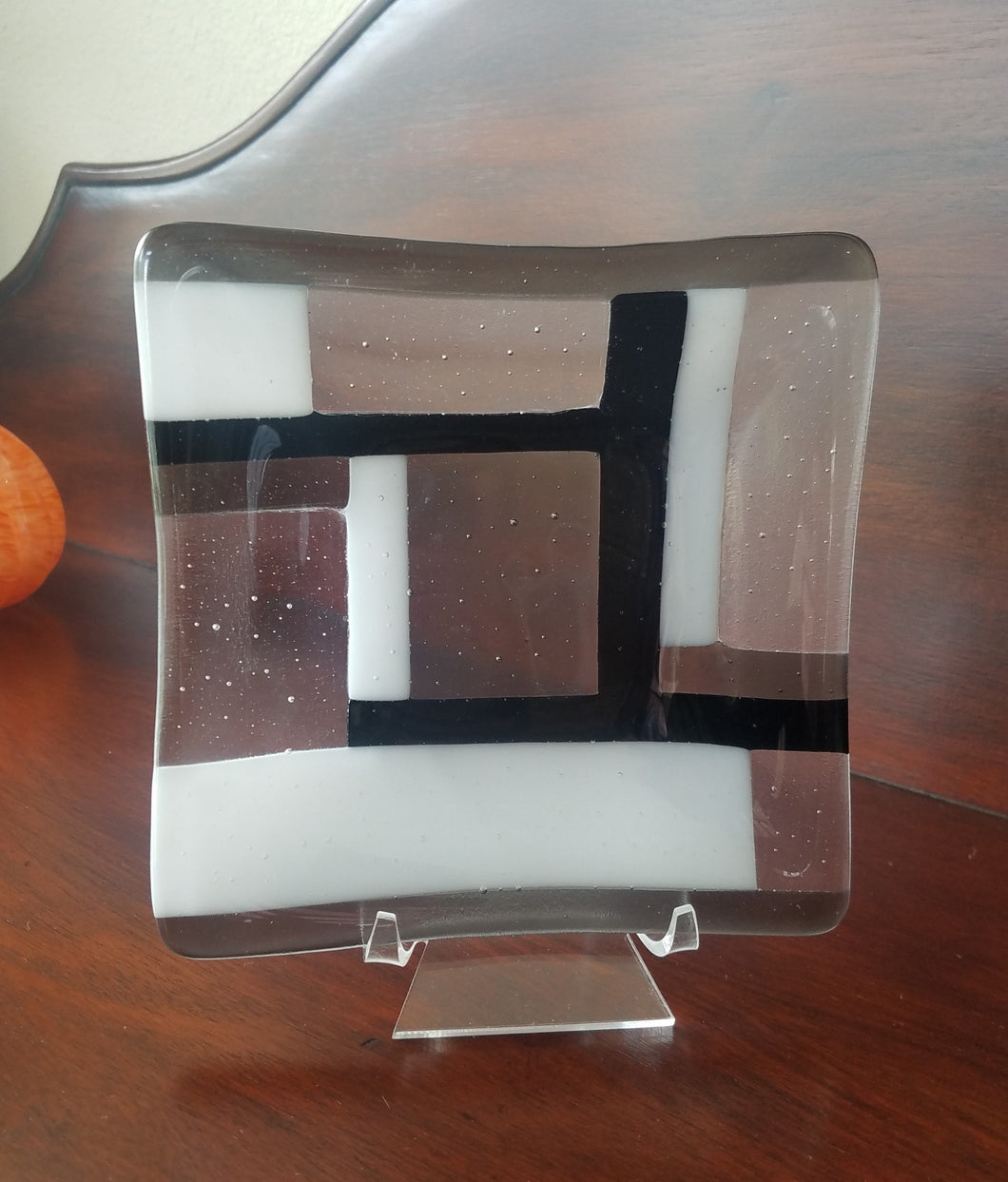 Beautiful hand-crafted decorative plate of a black and white design