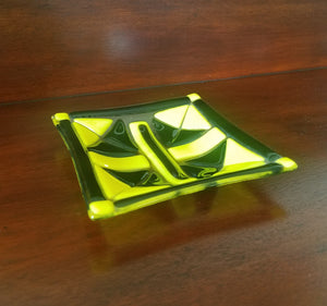 Beautiful hand-crafted decorative plate of a black and yellow design