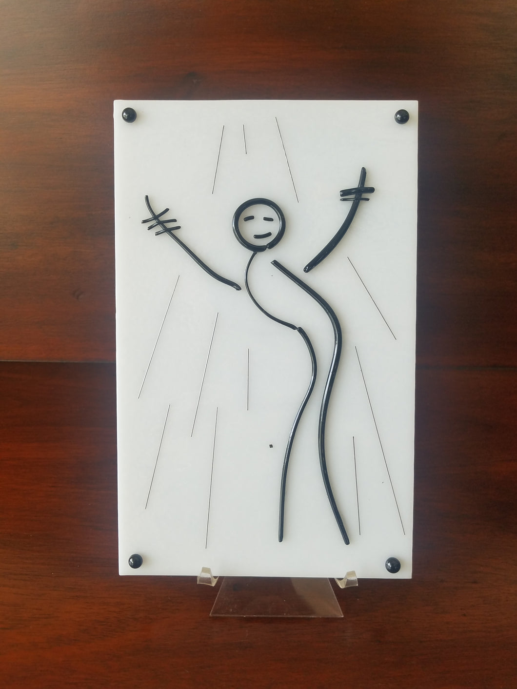 Enjoy the delightful dancer design on this hand-crafted decorative glass plate. Dimensions: 5-3/4
