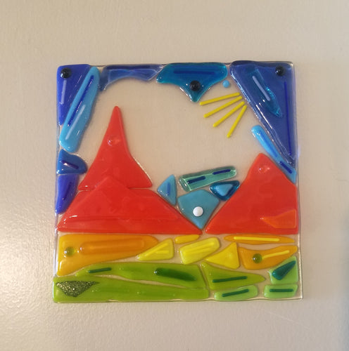 Attractive hand-crafted mountain mosaic design.  Dimensions: 5-3/4