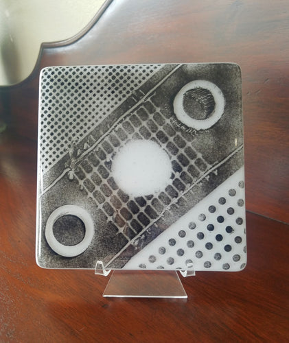 Hand-crafted decorative powdered glass plate with a polka dot design.  Dimensions: 5-3/4